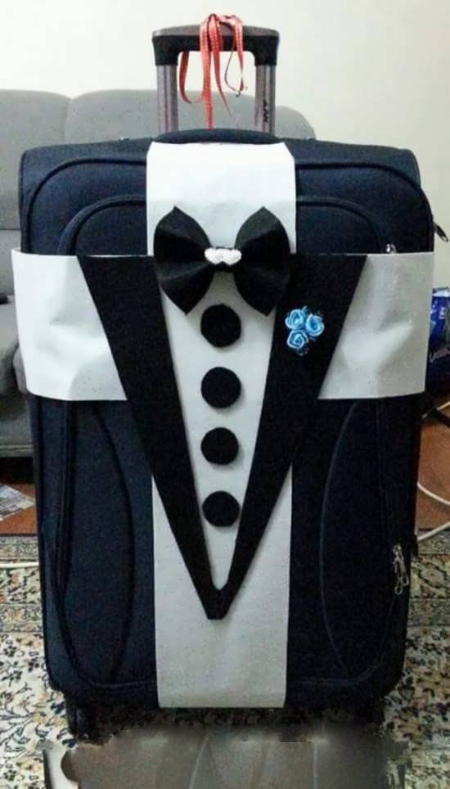 تزیین چمدان بافته‌شده